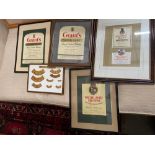 A Lot of vintage framed whisky labels which includes Dimple and Grants.