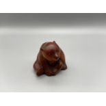 Japanese hand carved netsuke of a panda detailed with black bead eyes [3.5 cm]