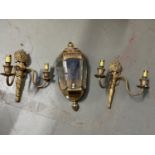 Two antique brass wall lights together with a Lime House Lamp Co outdoor wall lantern.