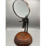 A reproduction Dollond London desk magnifying glass