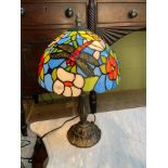 A Tiffany style dragon fly design table lamp. In a working condition. [41cm in height]