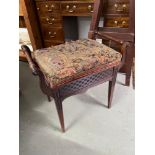 A Victorian lift top piano stool. Needs re upholstered.