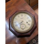 Antique one and eight day weight and spring wall clock by Seth Thomas of Thomaston Conn, U.S.A.