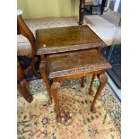 A Set of reproduction burr walnut [2] nest of tables fitted with bevel glass insert tops.