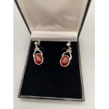 A Pair of 925 silver and amber earrings