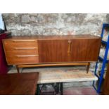 A Retro teak A.H.McIntosh & Co Ltd teak pedestal sideboard. Very stylish and unique. Consists of two