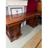 A Large impressive Victorian mahogany pedestal sideboard, Three wide drawers over two single