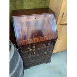 A Reproduction ladies narrow writing bureau chest.