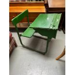 Antique Child's school desk, Has a lift up top, Ink well area, Base is made from metal. Originally