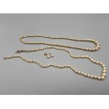 Antique pearl necklace designed with a 9ct Ciro clasp, A Vintage pearl necklace with a 9ct white
