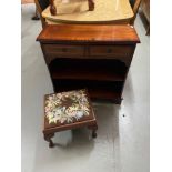 A Reproduction mahogany console bookcase unit and old footstool.