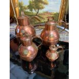 A Lot of four Martin's Guernsey copper measuring jugs.