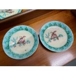 A Pair of 19th century Majolica bird design cabinet plates. [23.5cm diameter]