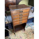 An early 1910/20's music cabinet. Designed with 5 drop end drawers and fitted with Art Nouveau