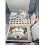 A quantity of loose and albums of stamps which includes a penny black with the album. And various