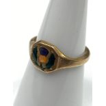 A Possible Gold signet ring designed with enamel painted thistle. [Weighs 2.17 grams] [Ring size M]