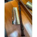 Antique wind instrument by John Grey & Sons London. Aulos recorder and one other