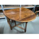 Antique solid oak barley twist leg, oval dining table. Designed with drop ends.