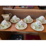 11 Piece Tuscan floral design coffee set.