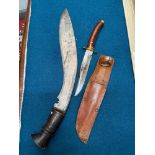 A 19th century Kukri knife with a wooden handle together with Brookes & Crookes hunting knife with