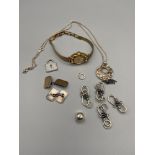 A Lot of mixed collectables to include 925 silver pendant with silver chain, 9ct gold on silver cuff