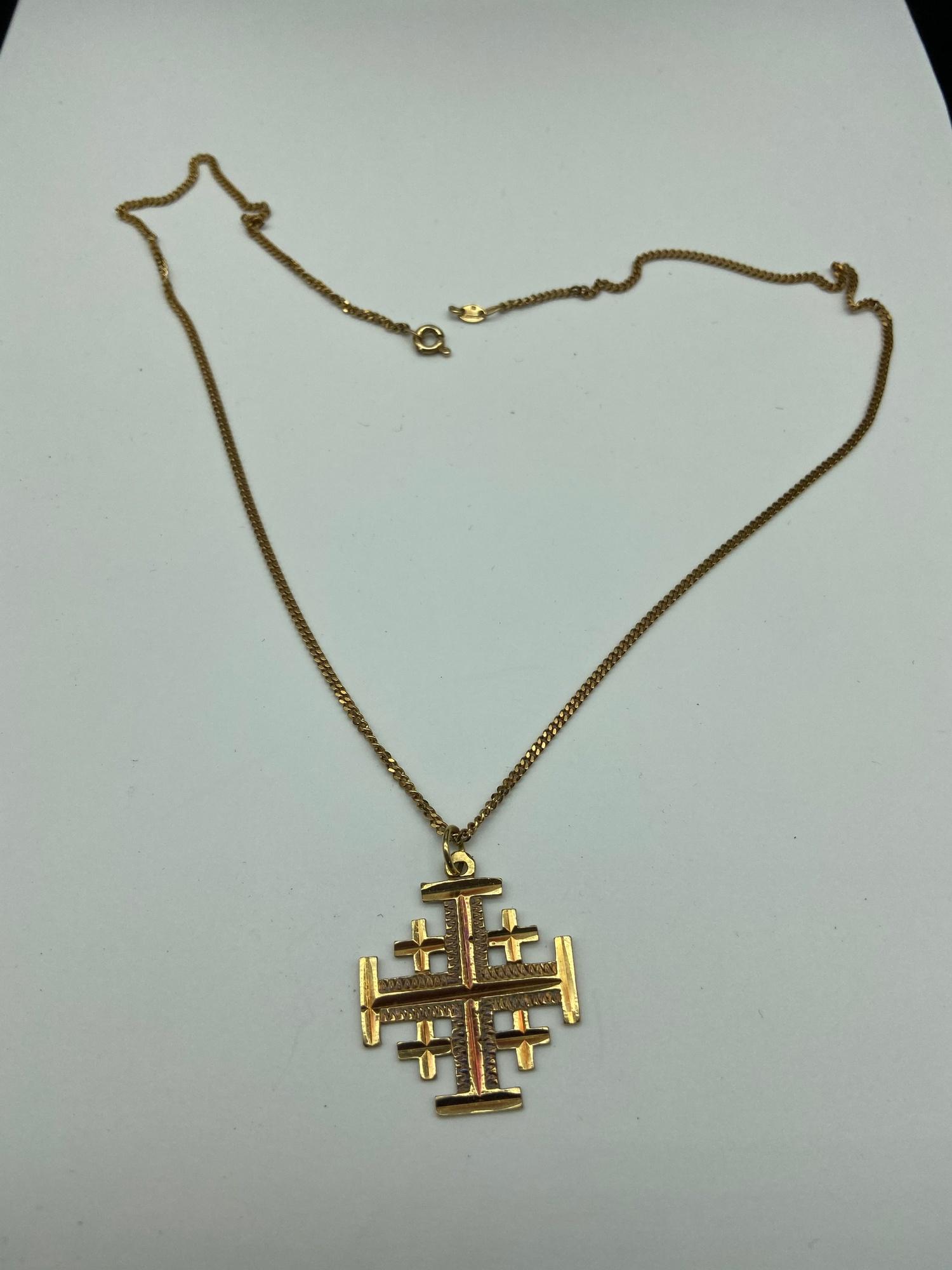 An 18ct gold Jerusalem cross pendant together with a 9ct gold necklace. [Cross weighs 3.43 grams] [