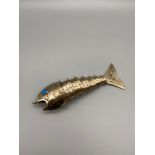 A Vintage Mexico Alpaca silver/ silver plate articulated fish bottle opener with blue stone eyes.