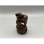 Japanese hand carved netsuke of an Ox detailed with black bead eyes, signed by the artist [5cm]