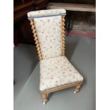 A Victorian Pine Pre Du Prayer chair. Designed with Barley twist sides and supported on original