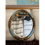 A Late Victorian barbola floral design oval wall mirror.