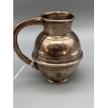 A Chester silver 1/4 Pint measure jug. Stamped A.P.Roger Maker Guernsey Regd 371786 to the base. [