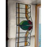 A Pair of Antique stain glass window sections