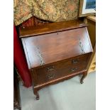 A Late Victorian writing bureau fitted with two drawers and interior drawers. Fitted with art
