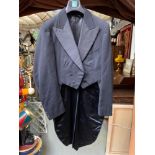 Antique Gentleman's evening coat with tails.