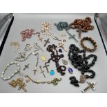 A Collection of vintage prayer beads and crucifixes