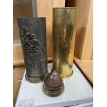 A Lot of two WW1 brass shells with engraved flower designs together with a brass shell fuse. [23cm