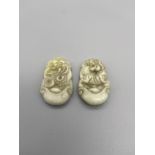 Two Chinese hand carved jade sculptures/ pendants detailing a snake and a tiger. [3.5cm in length]