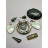 A Lot of various Jade jewellery which includes a pair of jade and silver earrings, Jade hoop with