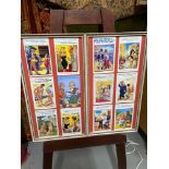 A Lot of 12 vintage 1960's/ 70's comical saucy postcards within two frames.