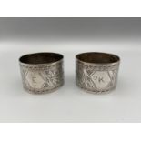 A Pair of Sheffield silver ornate napkin rings made by Walker & Hall.