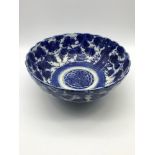 An 18th/19th century Chinese Blue and white Cherry Blossom design bowl. Possible signature mark