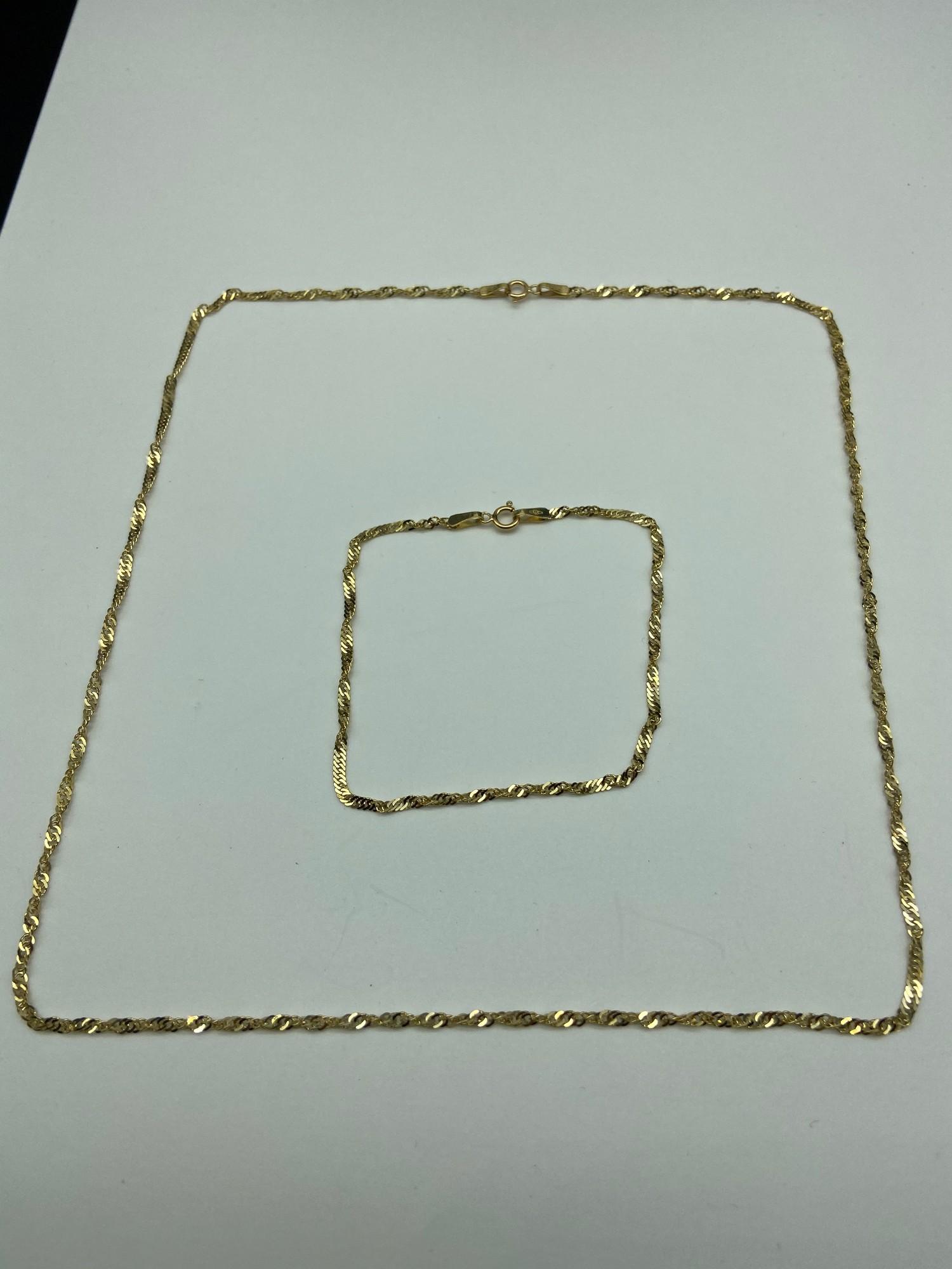 A 9ct gold necklace and bracelet. [Total weight 2.49 grams] [18 inch chain]