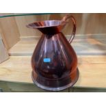 A Vintage Gallon copper jug. [24cm height]
