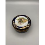 Antique Sachsen trinket box, printed couple to the top of the lid. Gilt hand painted trims and
