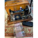Antique Pfaff K & L sewing machine. Ornately designed, comes with instruction booklet, Pfaff tin