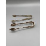 Two pairs of Sheffield silver sugar tongs. Art deco style set is made by James Dixon & Sons Ltd