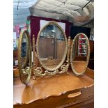 A Vintage gilt framed three way dressing table mirror.