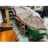 A Vintage Art Deco style parasol/ Umbrella, designed with a chicken trim material and a wooden