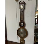 A Georgian Mahogany wall barometer/ Thermometer. Has original Mercury still intact.