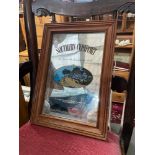 A Vintage Southern Comport advertising mirror fitted within a wooden frame.